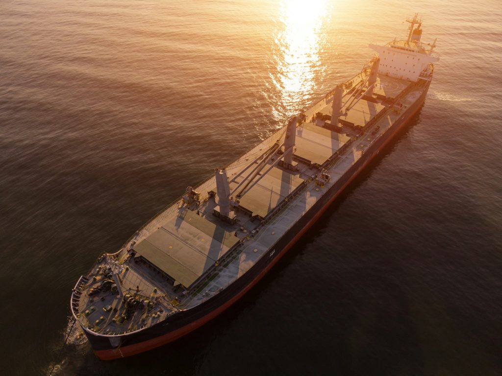 Large general cargo ship tanker bulk carrier, Top down aerial view.